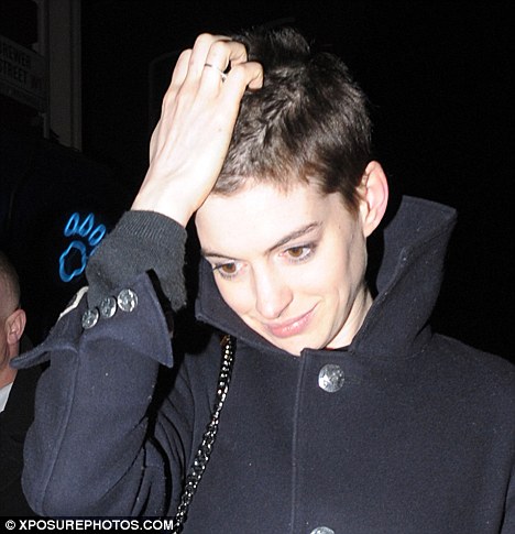 London calling: Anne Hathaway was spotted with a short back and sides haircut leaving the well known Box club in Soho
